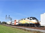 Southbound Sunrail Train # P315 heading away from the camera toward the last stop of Poinciana